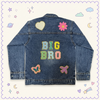 Dark wash kids denim jacket with BIG BRO chenille letter patches and heart, flower, butterfly and aeroplane motifs on the back